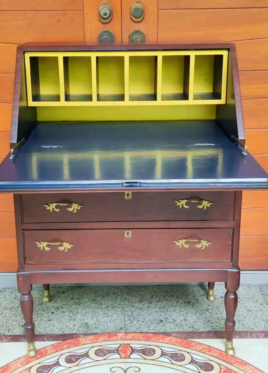 The restored bureau open, showing its blue writing surface and gold interior