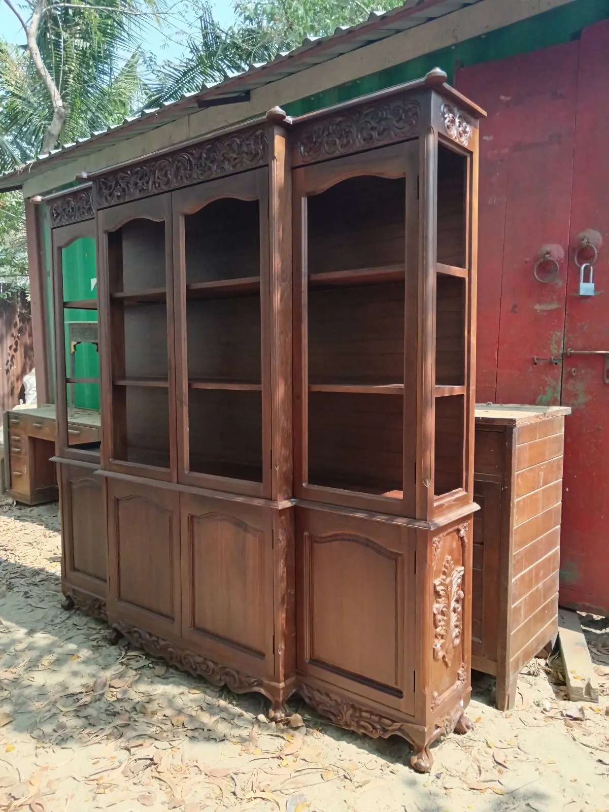 An antique hutch cabinet in the Mickey's Real Wood workshop yard